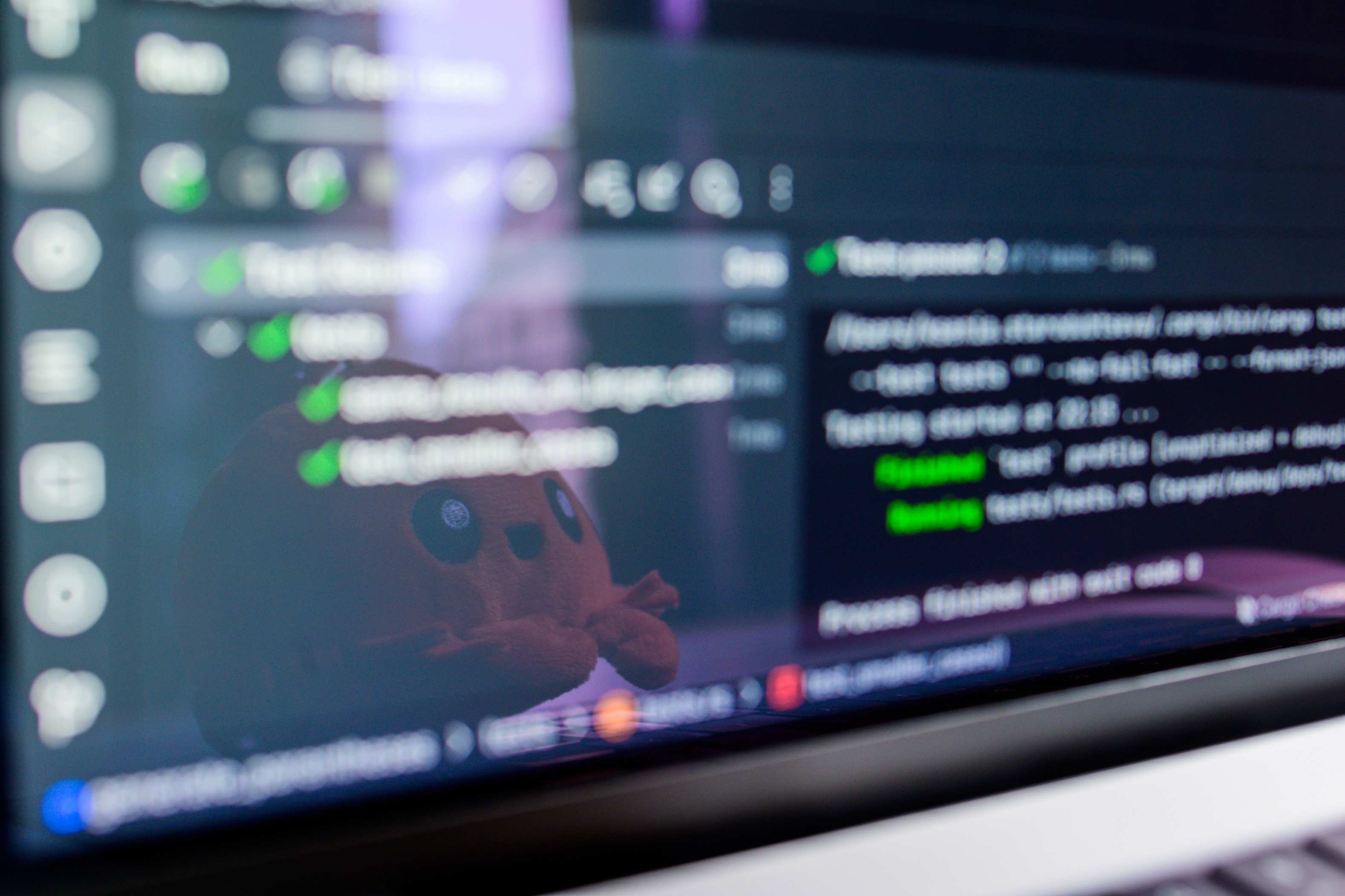 Computer screen showing programming code on a laptop display