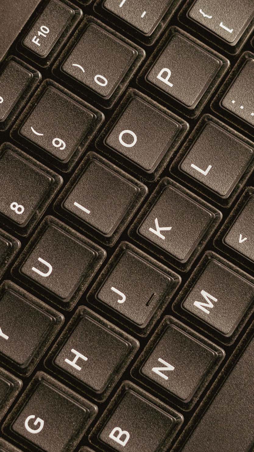 Close view of black computer keyboard keys